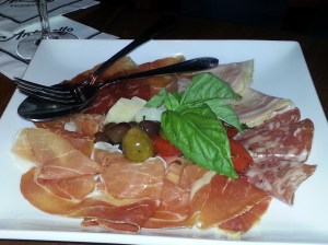 Antipasto Misto - Prosciutoo San Daniele, Porchetta, Bresaola, Salami Fileno, Parmigano, Marinated Olives, and Roasted Peppers