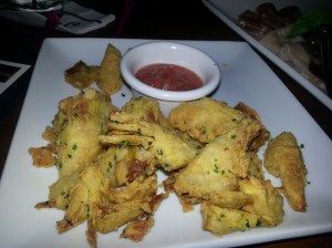 Calamari Fritti - Fried squid, spicy, tomato sauce, and lemons