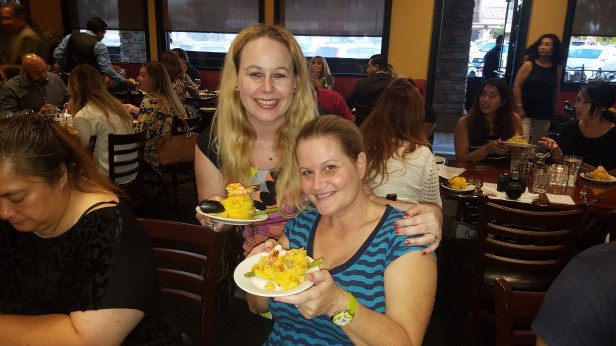 With my friend enjoying paella at Villa Roma - Paella Wine and Beer Festival